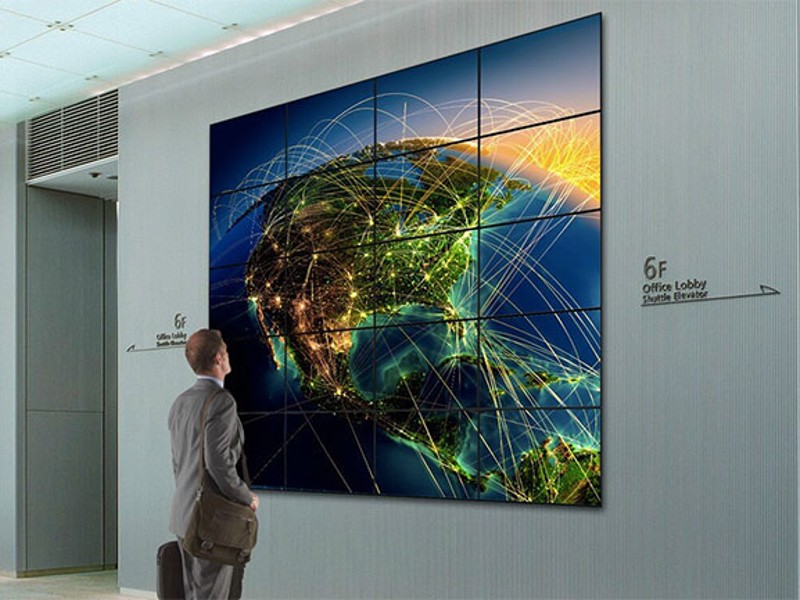 Écran de communication en entreprise sous forme de mur d'images interactif