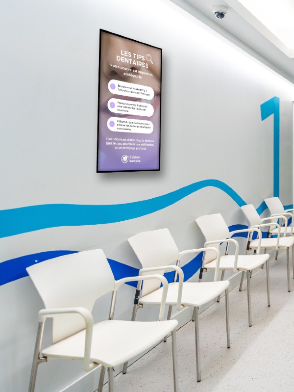 Écran d'affichage dynamique dans la salle d'attente d'un cabinet dentaire